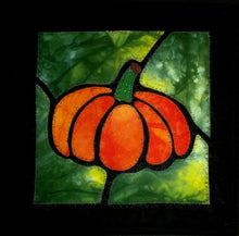 Load image into Gallery viewer, Stained glass pumpkin on a green leafy background