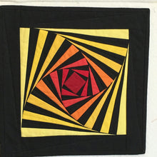 Load image into Gallery viewer, Colorful spiral patterned fabric on a black background
