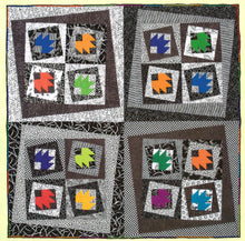 Load image into Gallery viewer, Colorful quilt with geometric patterns in a grid layout