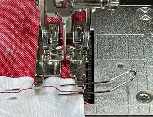 sewing machine stitching fabric