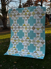 Load image into Gallery viewer, Quilt with geometric pattern on grassy area
